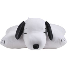 Snoopy plush pillow lying down, white body with black nose and floppy ears