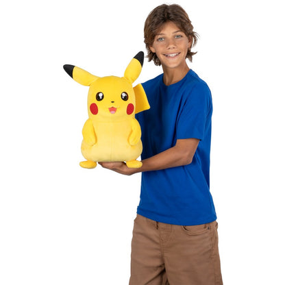 Boy presenting Pokemon Puppetronic Plush Pikachu