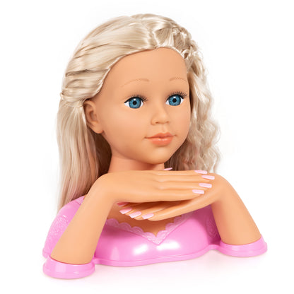 Blonde doll styling head with blue eyes and glossy white nails covering hands.