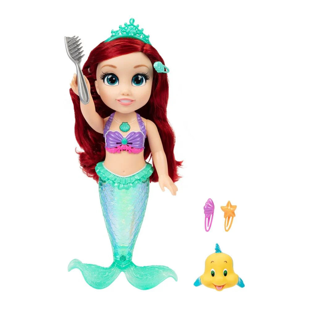 Singing mermaid doll with red hair and crown, holding trident, purple top, teal tail