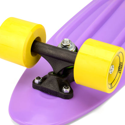 Purple skateboard truck assembly with yellow wheels and black hardware