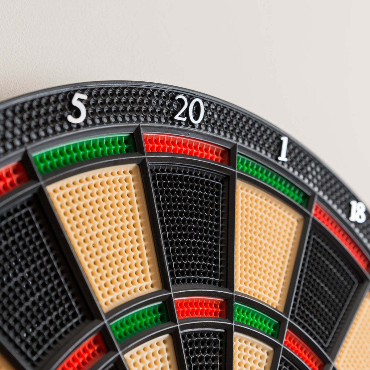Close-up of electronic dartboard segments with numbers 5, 20, and 1