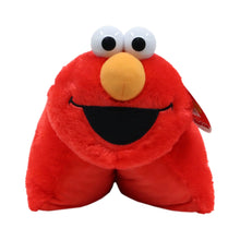 Red Elmo plush pillow with big white eyes and embroidered smile