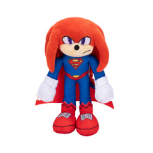 9-inch plush superhero with orange dreadlocks, blue suit, white gloves, red cape, red shoes