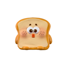 Beige toast slice plush with large white eyes and orange-red nose