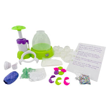 Squishy maker accessories set: green base press, molds, glitter packets, and instruction sheet.