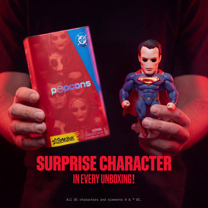 DC Heroes blind box canister with small Superman-style mini figure