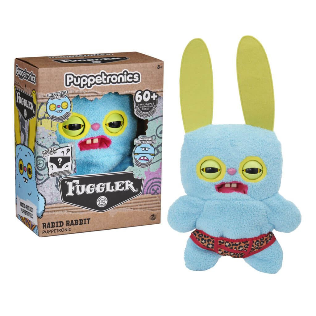Fuggler Rabid Rabbit plush toy with long yellow ears, blue fur and red patterned underwear beside its box
