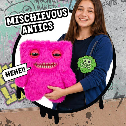 Deluxe Puppetronics Fuggler Mr. Buttons plush toy with bright pink fur, button eyes, and teeth