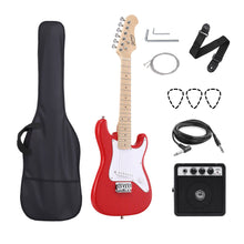 Red junior electric guitar set with gig bag, mini amp, cable, strap, picks, and tools