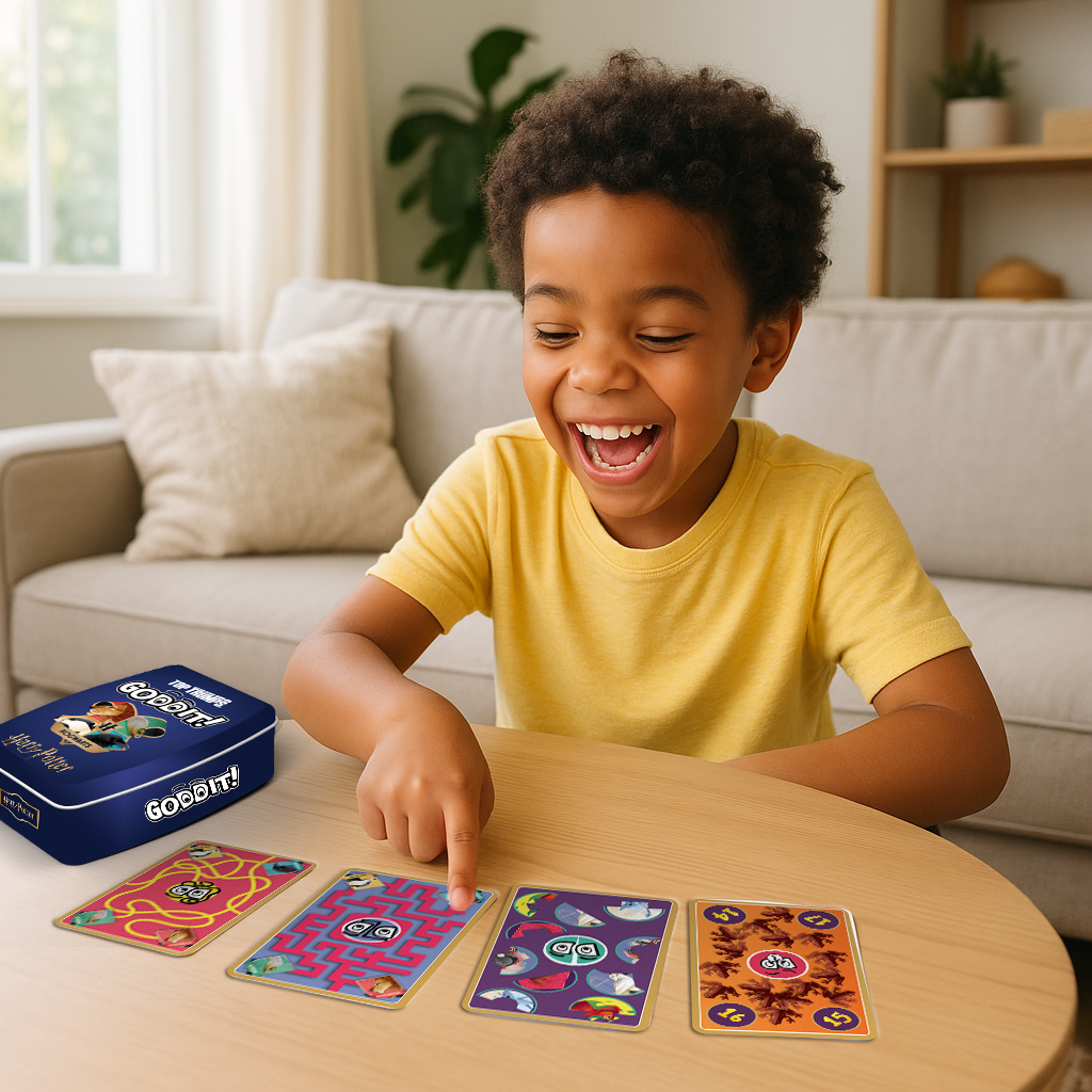 Wizard-themed card game cards laid out on table with blue GODDIT! box