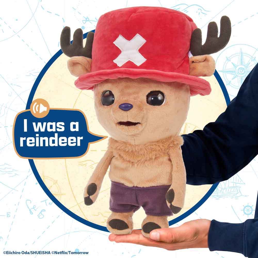 Chopper plush puppet with antlers, red hat, and purple shorts, shown in a speaking pose