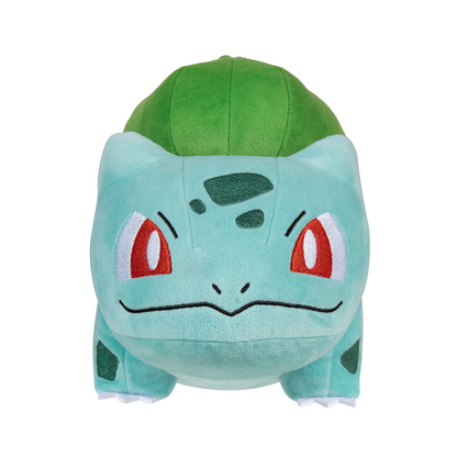 Bulbasaur plush toy with green top and light blue face, red eyes and stitched smile