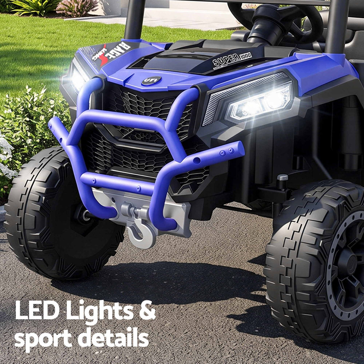 Blue electric ride-on jeep close-up with LED headlight and bull bar; front tires