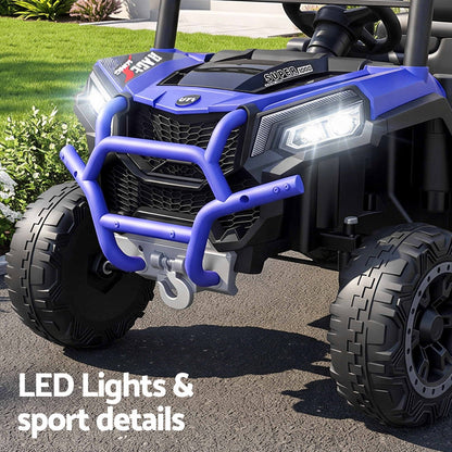 Blue electric ride-on jeep close-up with LED headlight and bull bar; front tires