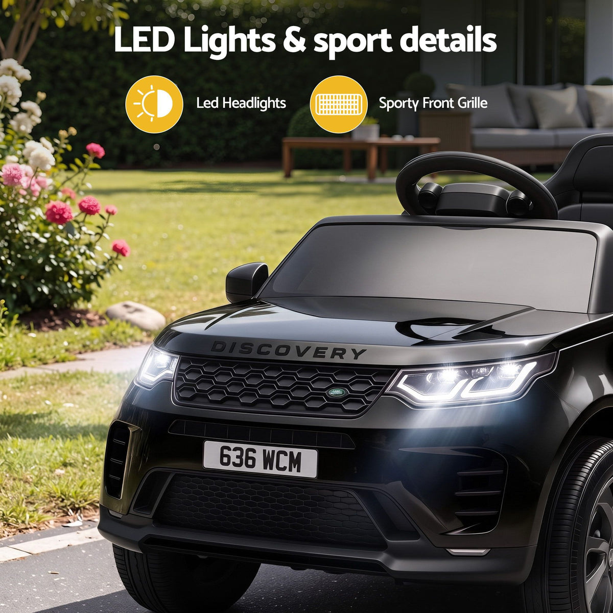 Close view of ride-on SUV front grille and illuminated LED headlights