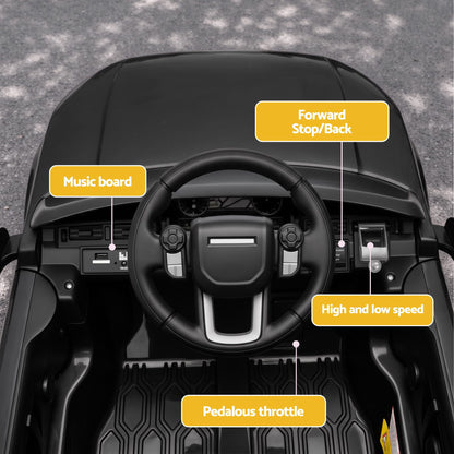 Land Rover ride-on SUV interior with steering wheel, music controls, speed switch, and pedal throttle