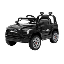 Black Toyota Sequoia TRD Pro kids' ride-on SUV with open sides and silver wheels
