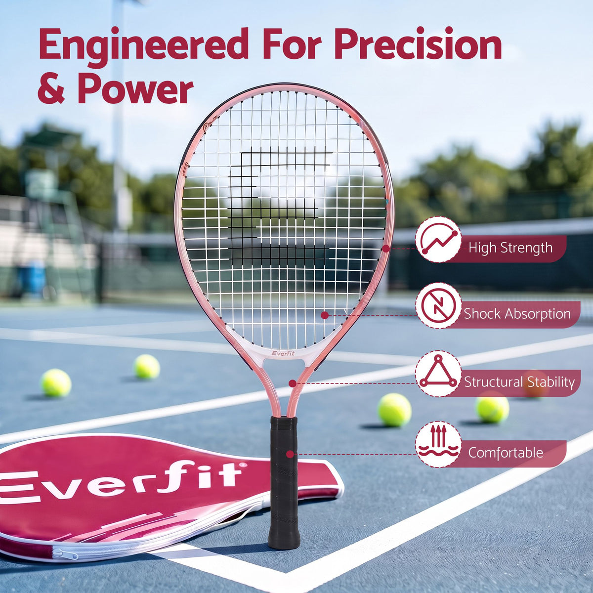 Pink Everfit tennis racket with black cushioned grip on outdoor court