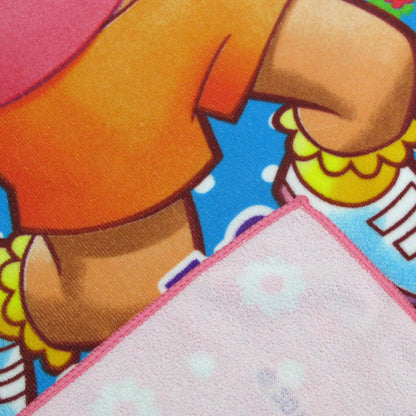 Microfiber beach towel close-up of printed cartoon character and white terry pile