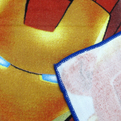 Microfiber beach towel corner with blue stitched border and character print