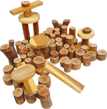 Assorted wooden tree blocks set with round discs and cross-shaped log pieces