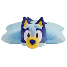 Folded blue plush character pillow with yellow nose and white muzzle accents