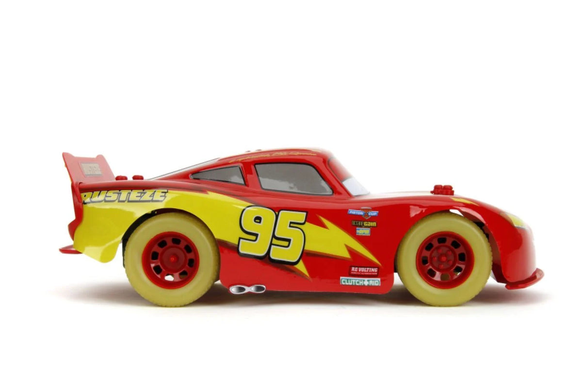 Red and yellow glow RC car side view with number 95 decals