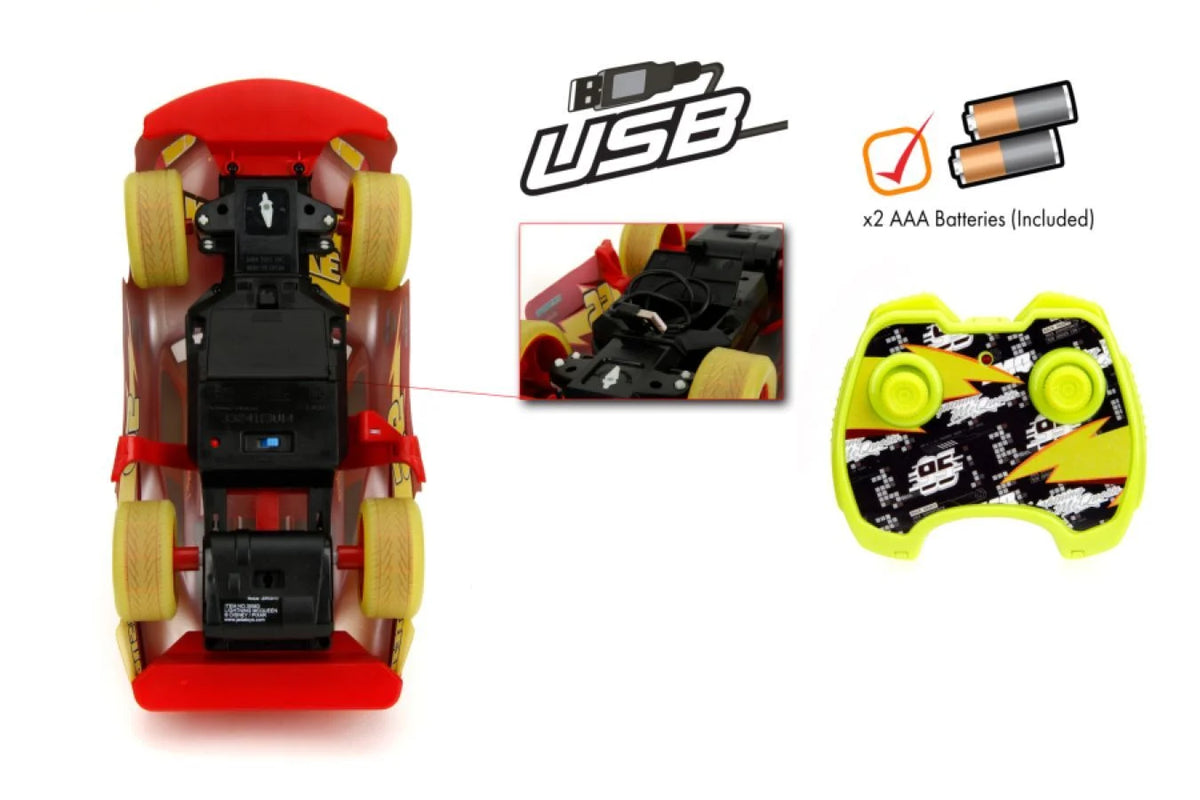 Glow RC car underside view with open battery compartment and wheels
