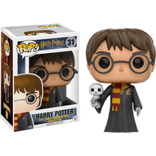 Harry Potter vinyl figure with glasses holding Hedwig, dark robe and red scarf