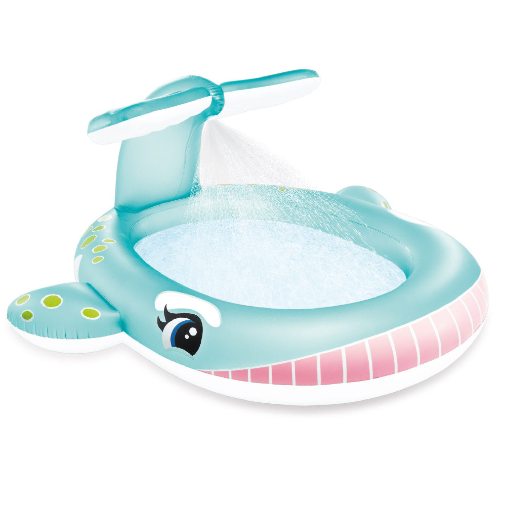 Turquoise inflatable whale spray pool with open basin, whale face, and pink rim